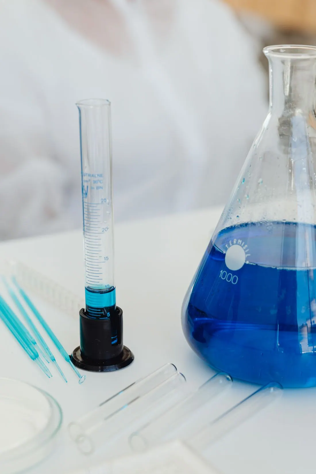 A close-up study of chemical materials and laboratory glassware